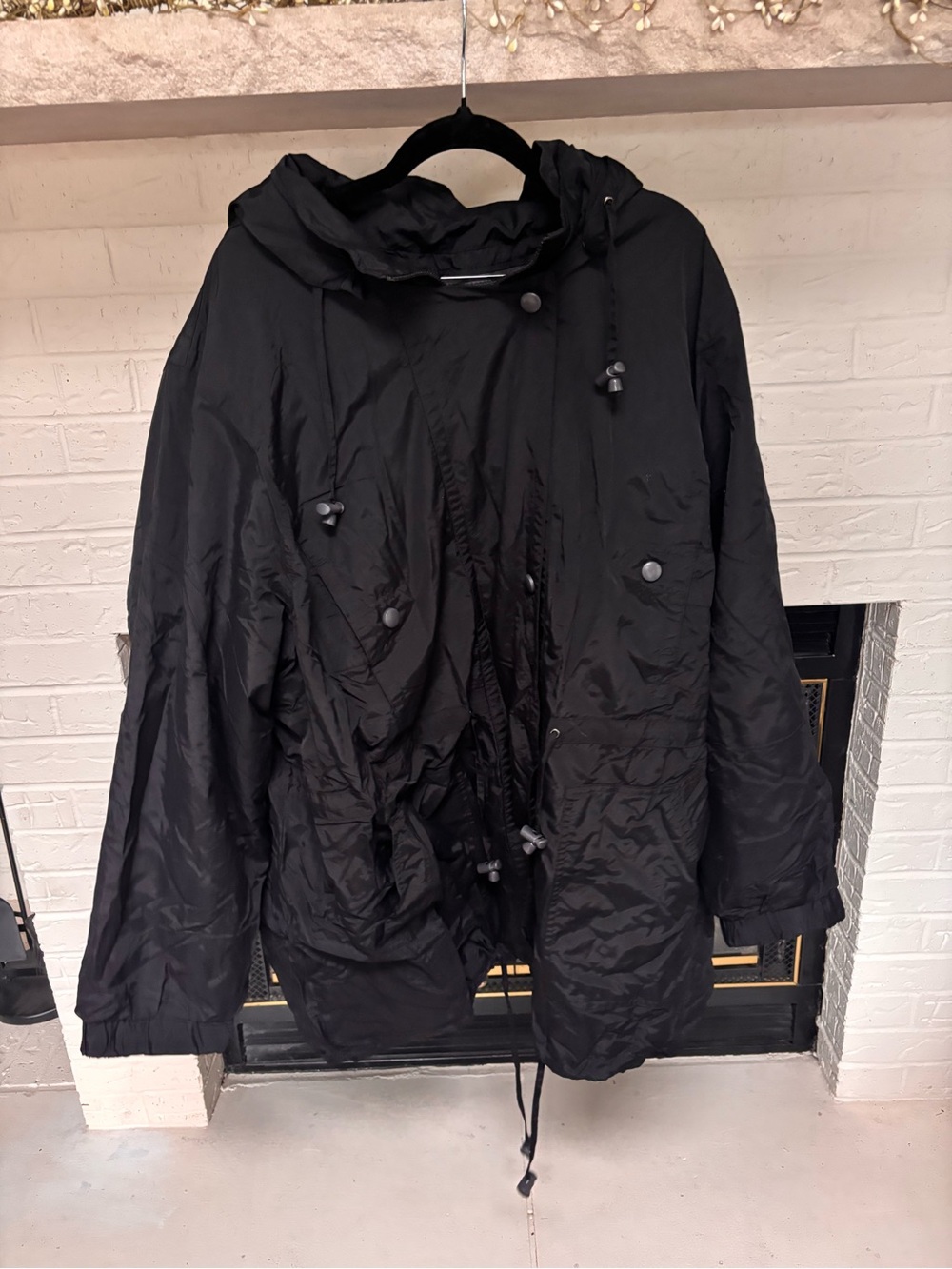 Woman Within Black Hooded Raincoat